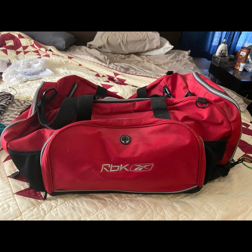 Large red duffel bag